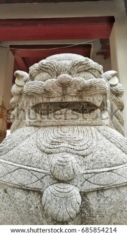 Lion Stone carving on front