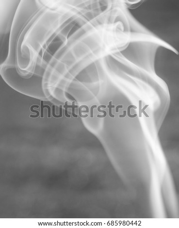 A digitally manipulated photograph of a waft of smoke from an incense cone. This photo was taken in Brisbane, Australia. 