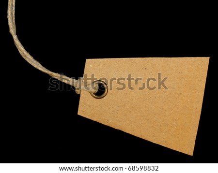 cardboard blank tag isolated on black background