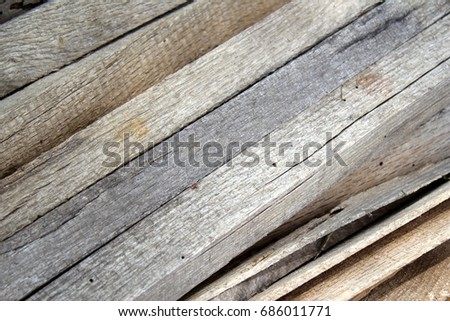 Close up isolated photo of soft weathered hand cut wood slats kindling at a diagonal for background texture Industrial
