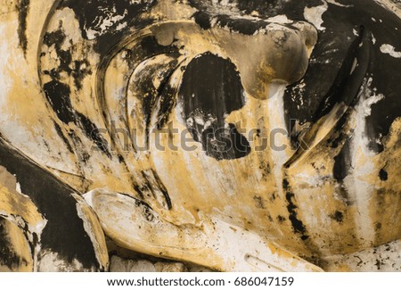 Face of buddha statue is smiling at Logaya temple in Thailand. Image is abstract art.