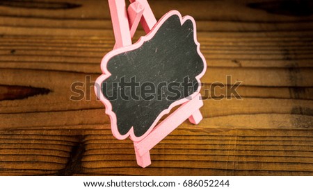 Wooden Board Isolated Over Wooden Background. Copy Space.