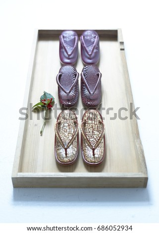 Sandals three sisters Royalty-Free Stock Photo #686052934