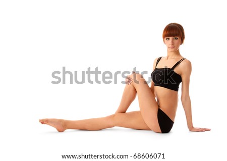 young woman doing exercise isolated on white background