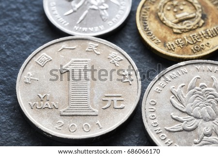 Extreme close up picture of Chinese yuan, shallow depth of field.
