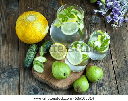 A healthy drink with cucumbers,