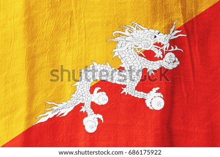 Bhutan national flag from fabric for graphic design.