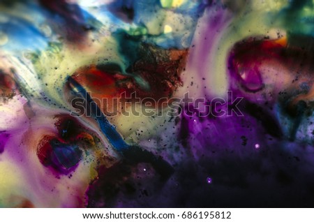 Watercolor paint dissolves in water, Colored abstractions