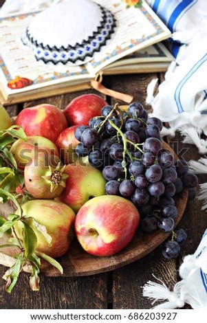 Rosh hashanah holiday background - Yarmulke , honey jar and fruit plate