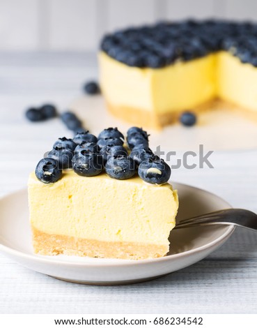 Creamy cheesecake with blueberry, vertical, selective focus