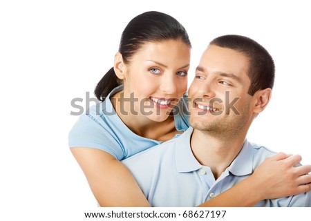 Portrait of young happy smiling attractive couple, isolated on white background