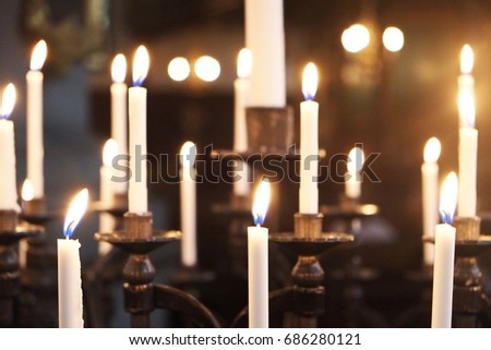 Burning candles in a church in Sweden