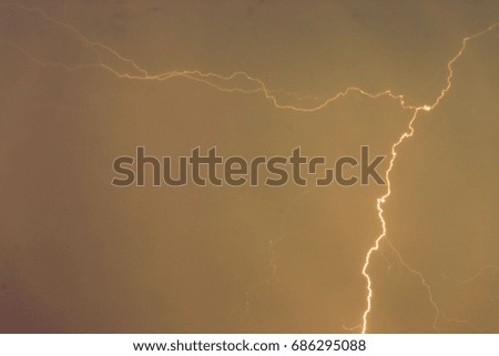 Lightning bolts against the backdrop of a thundercloud