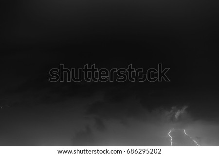 Lightning bolts against the backdrop of a thundercloud
