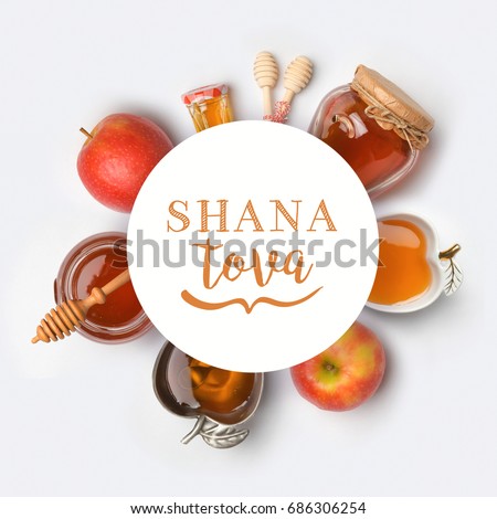 Jewish holiday Rosh Hashana banner design with honey and apples. View from above. Flat lay Royalty-Free Stock Photo #686306254