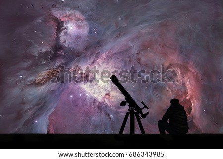 Man with telescope looking at the stars. The Orion Nebula Messier 42 diffuse nebula  in constellation Orion.
Elements of this image are furnished by NASA.