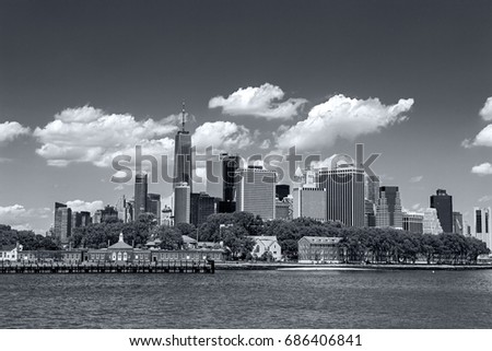 daytime panorama view of the New York City Manhattan with a view of Governors Island