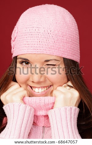 smiling young woman isolated, winking