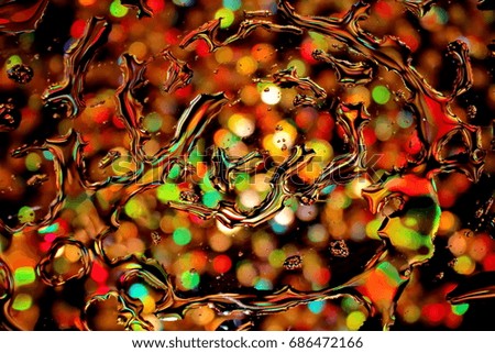  beautiful background with colored highlights and water droplets against a black background