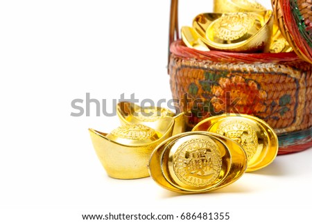 Chinese new year festival decorations , the chinese character on the gold ingots means fortune and luck