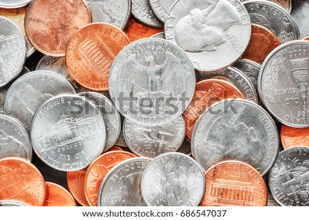 Extreme close up picture of United States dollar coins, shallow depth of field.