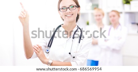 Woman doctor standing at hospital
