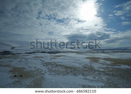 
Snow mountain landscape of the grasslands