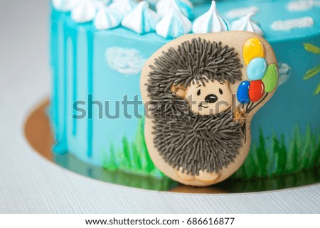 Closeup of gingerbread with a picture of a hedgehog in a baby cake