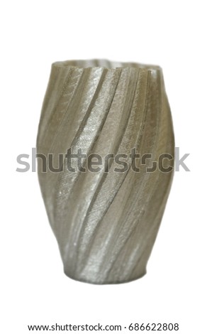 Objects printed by 3d printer Isolated on white background. The figure of a gray vase. Progressive modern additive technology. Concept of 4.0 industrial revolution