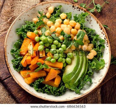 Chickpea, pumpkin and avocado vegetarian buddha bowl. Healthy food concept. Vegan food.