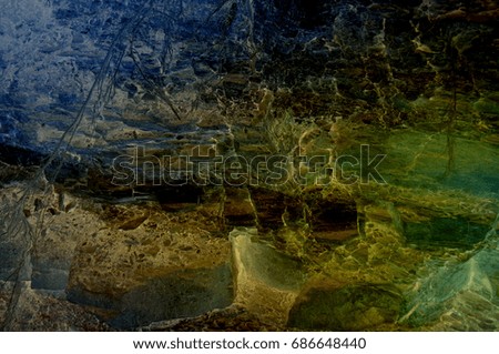 Abstract grunge dark blue black yellow green dirty brown textured stone wall crack background art