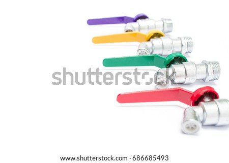 Colorful Faucet water arranging on white background
