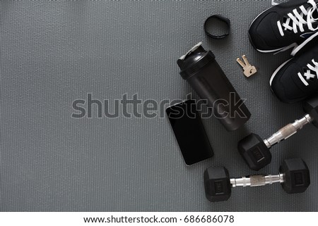 Fitness flat lay background, male sport equipment for training and outfit, copy space. Weightloss, healthy lifestyle concept Royalty-Free Stock Photo #686686078