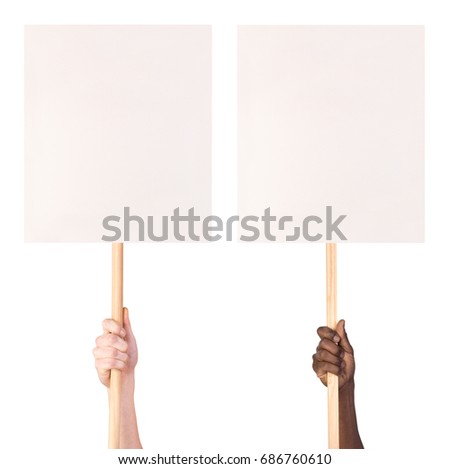 Protest signs held in hands, isolated on white background Royalty-Free Stock Photo #686760610
