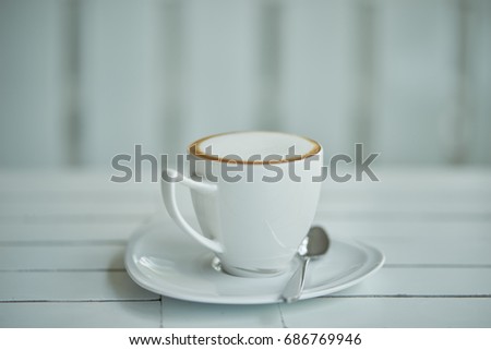 Hot coffee on the table white