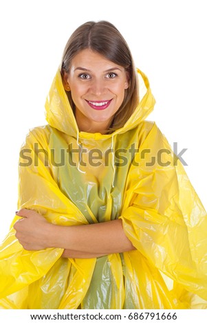  Picture of attractive caucasian woman wearing a yellow raincoat, posing on isolated background