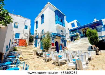 Cityscape with typical white blue colored houses in resort town Sidi Bou Said. Tunisia, North Africa Royalty-Free Stock Photo #686855281
