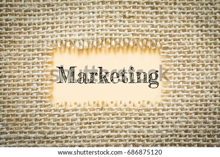 Text Marketing on paper Orange has Cotton yarn background you can apply to your product.