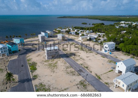 Aerial image of Florida Keys single family homes on stilts under construction