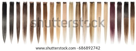Various colors of straight single clip in human hair extensions Royalty-Free Stock Photo #686892742