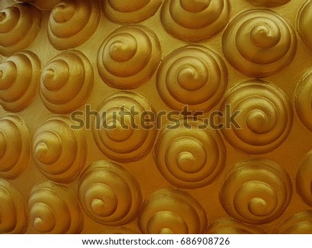 Golden spiral pattern background.Golden spiral on the head of buddha. Spiral pattern on the heads of Buddha statues.