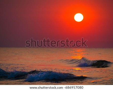 Beautiful sunrise Black sea. Gold sea sunrise and waves. Little Noise.