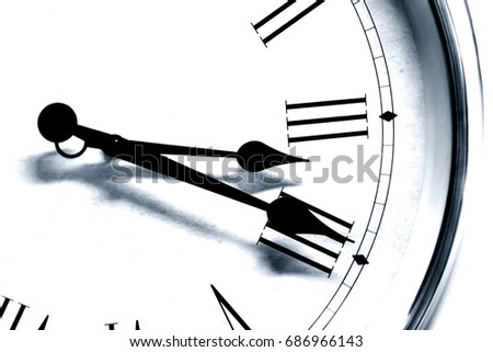 Closeup antique old style clock time roman hour number black and white tone
