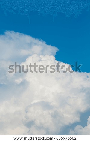 vertical sky with fluffy bright clouds