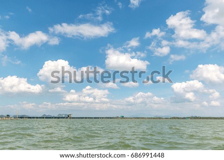 Sea water and blue sky with cloudy background