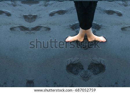 White feet on black beach sand,,natural beach near Puerto de la Cruz on the island of Tenerife,Symmetrical photographs,  magical realism,surreal photography,abstract,magical picture just for crazy, 