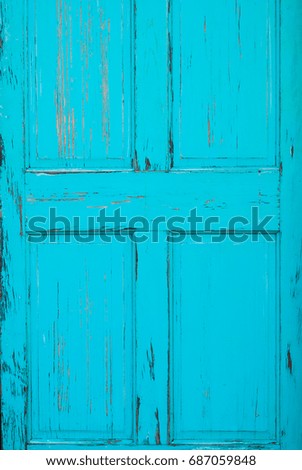 Fragment Vintage Old Blue Grunge Door.Wooden background.