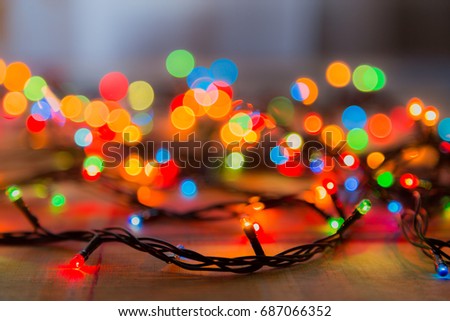 Colored lights Christmas garlands. Colorful abstract background.