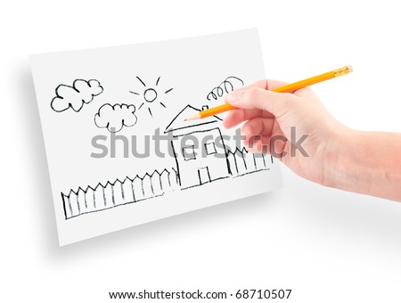 woman's hand with the pencil drawing the dream home on a white sheet of paper