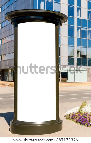 Advertising column mockup. Blank public information board mock up in front of the modern architecture building